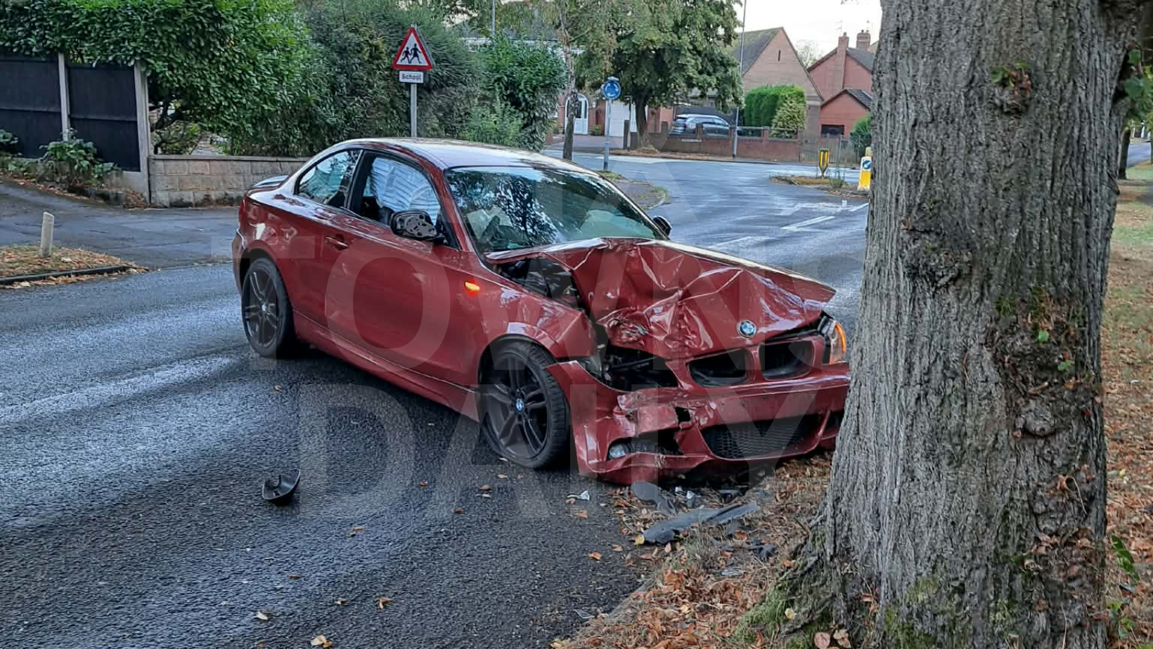 Crashed Red BMW